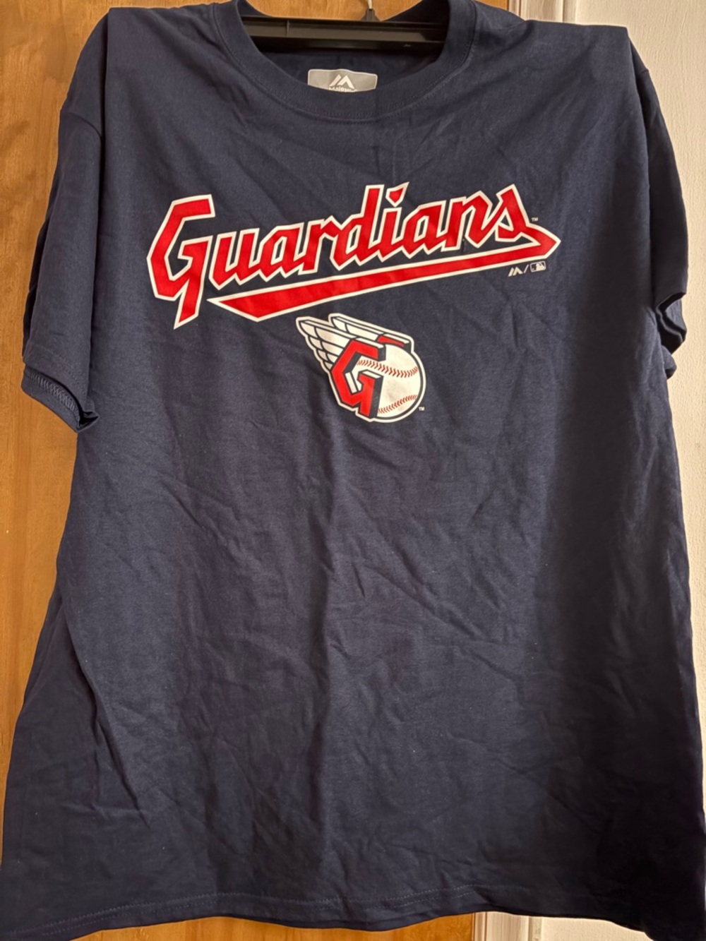 Genuine Merchandise Navy Tee with Red & White Logo